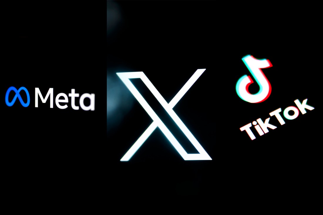 Meta、TikTok和X社交媒体标识显示在黑背景上